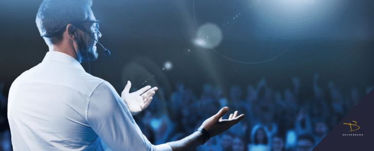 An-event-emcee-in-front-of-an-audience