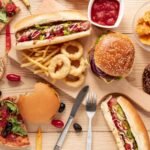 6820617c034820a8b998bb3c_671ead7edc757970e5115697_671eacfbb6f7a79d7ce2adde_top-view-arrangement-with-food-wooden-background_23-2148308806