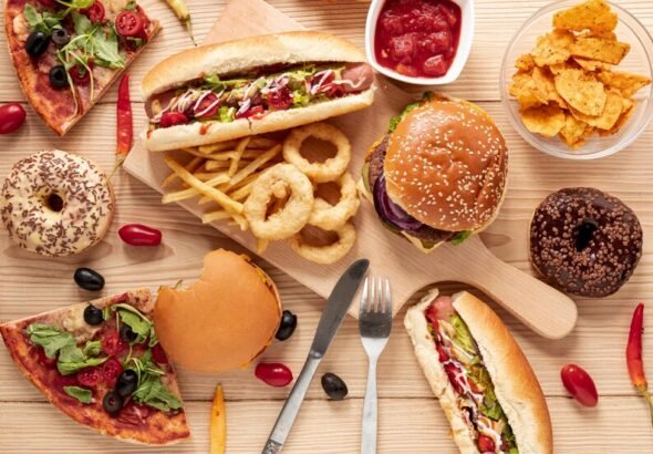 6820617c034820a8b998bb3c_671ead7edc757970e5115697_671eacfbb6f7a79d7ce2adde_top-view-arrangement-with-food-wooden-background_23-2148308806